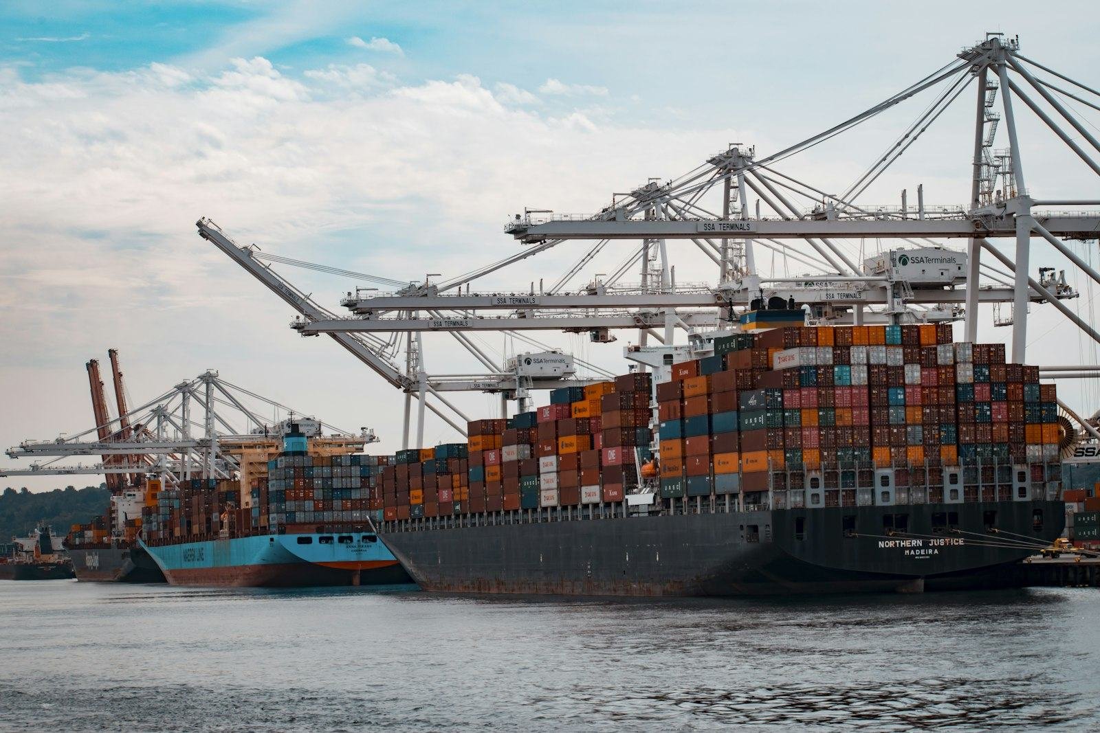 Container ship being loaded at port